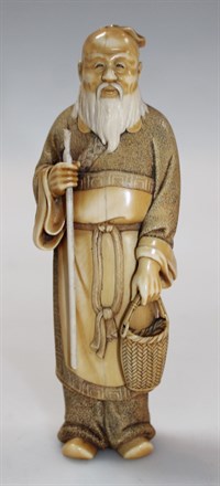 Lot 3001 A Meiji period Japanese ivory okimono figure of a scholar