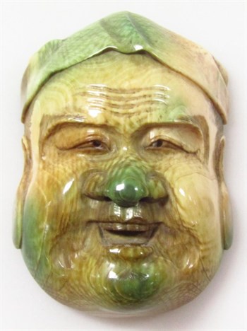 Lot 3012 A Chinese heavily polished Buddha head