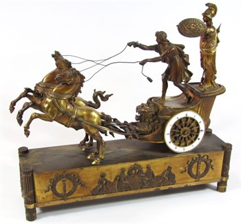 1 An early 19thC Parisian Empire ormolu mounted mantel clock