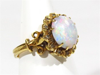 Thumbnail _lot 23 An 18ct gold ladies opal dress ring