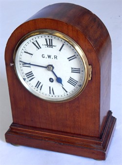 1045 An early 20thC mahogany cased railway mantel clock