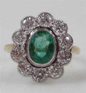 Thumbnail _lot 142 An 18ct gold emerald and diamond floral cluster ring