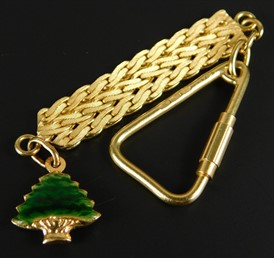 Thumbnail _lot 42 An 18ct gold keychain, with enamel decorated fir tree drop