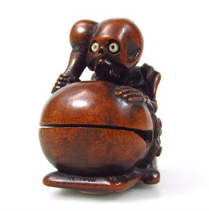 1999 A Meiji period Japanese carved hardwood netsuke