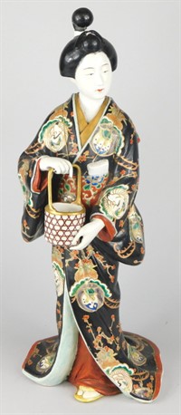 2033 A 19thC Japanese porcelain Meiji figure