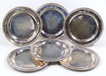 lot 1101 A set of six George III silver plates, by James Young