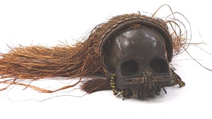 Lot 375 A West African type voodoo skull